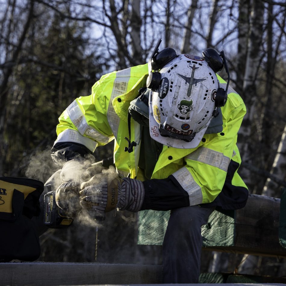 A CCB worker drilling outside