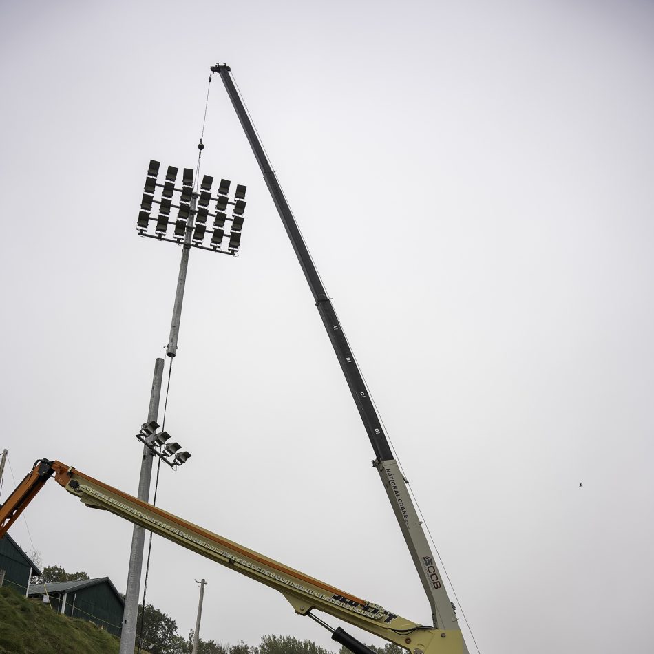 The CCB team installing a stadium light