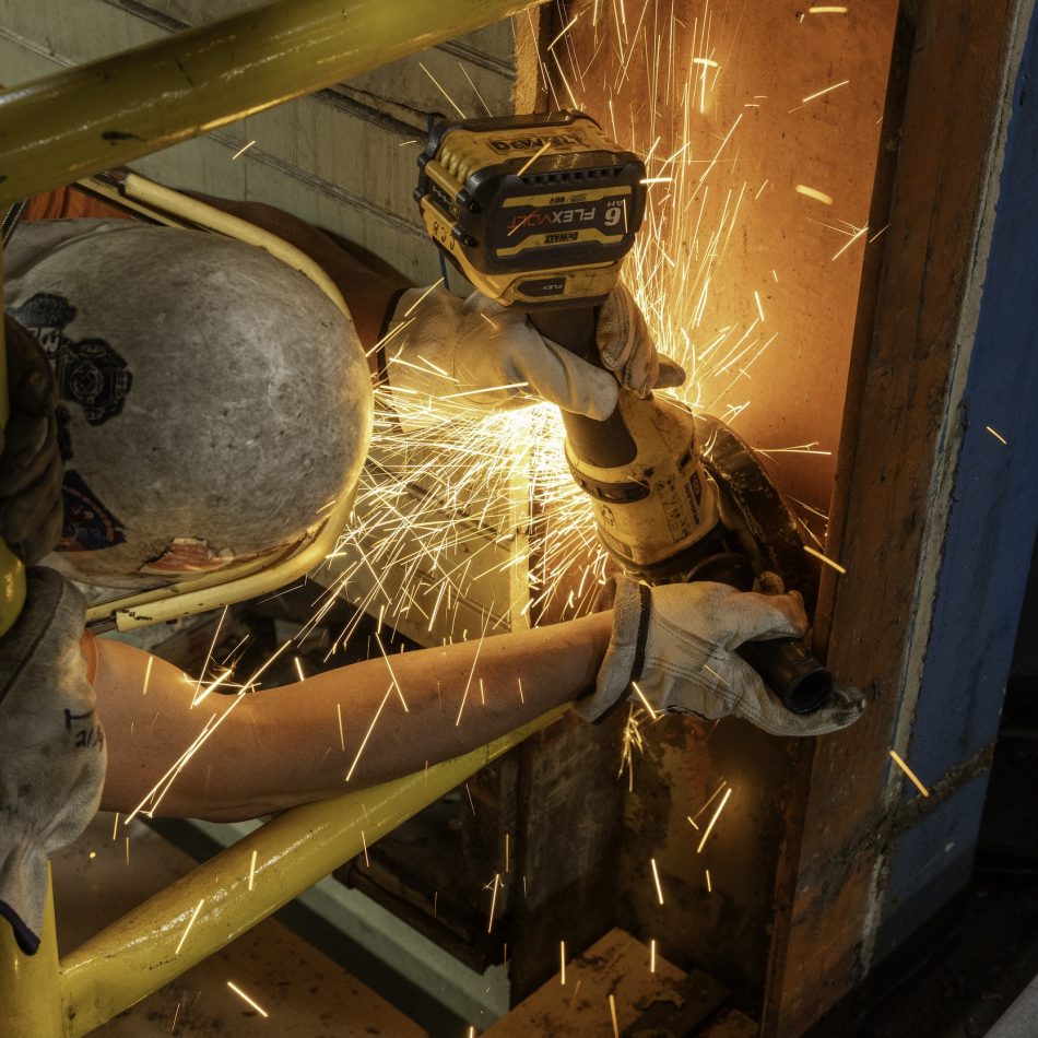 Sparks flying as a worker does some welding